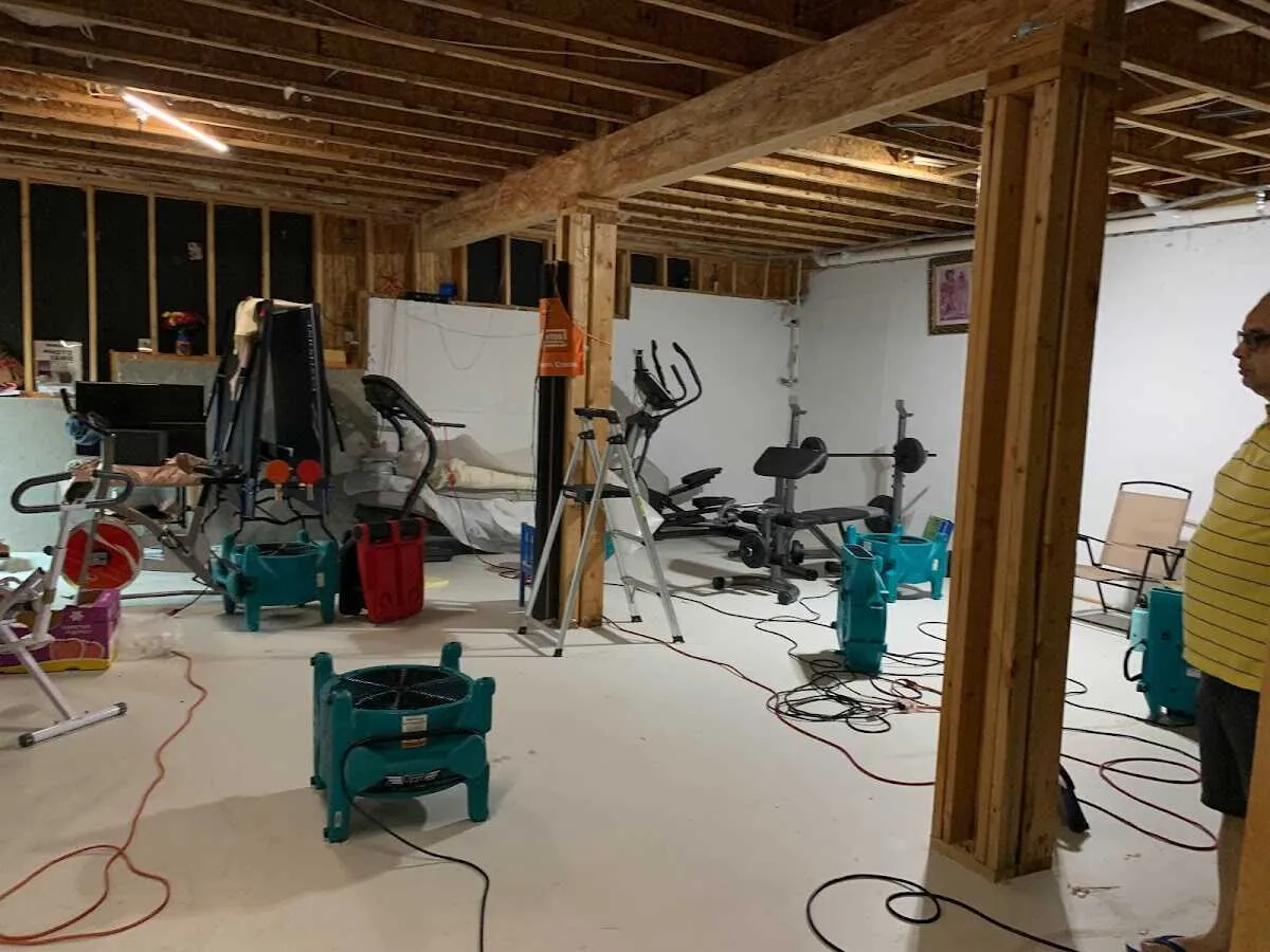 Basement drying equipment setup for Contents Cleaning & Restoration in Los Alamos